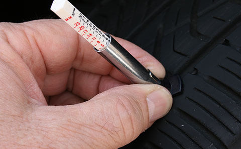 checking the tire tread depth