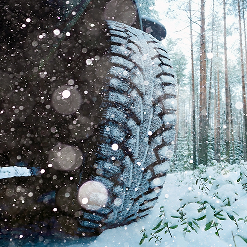 Winter car wheel studs, the concept of winter car ride.
