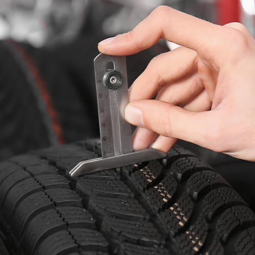The tire tread being measured to prevent excessive wear