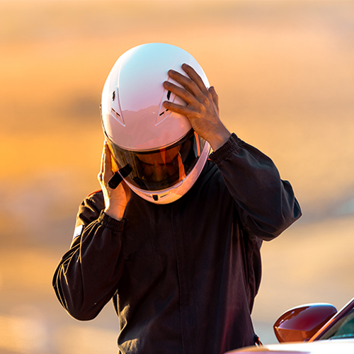 racing driver in a helmet